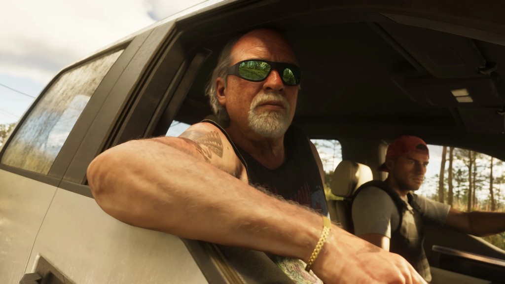 Brian Heder riding shotgun in a silver pickup