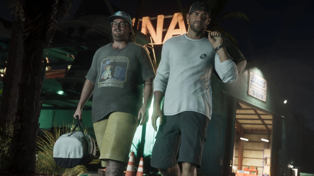 Cal Hampton and Jason walking through a marina at night
