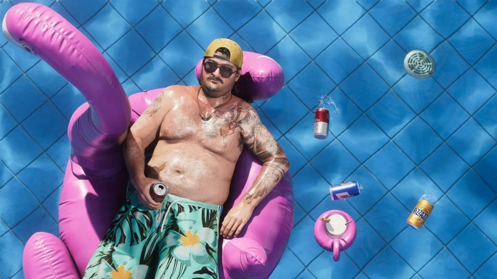 Cal Hampton lounging on a pink float in a pool