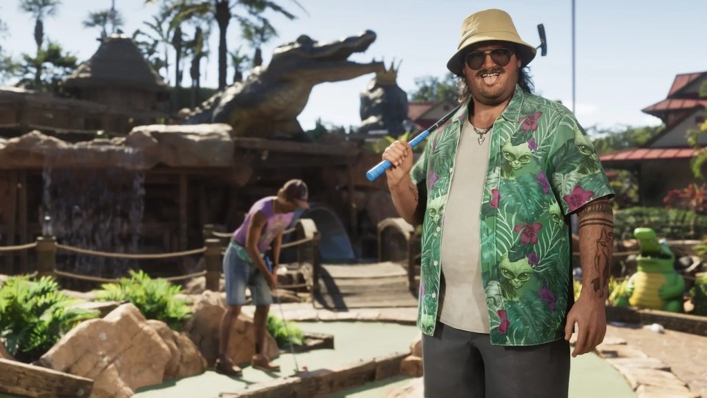 Cal Hampton on a tropical mini-golf course with a putter