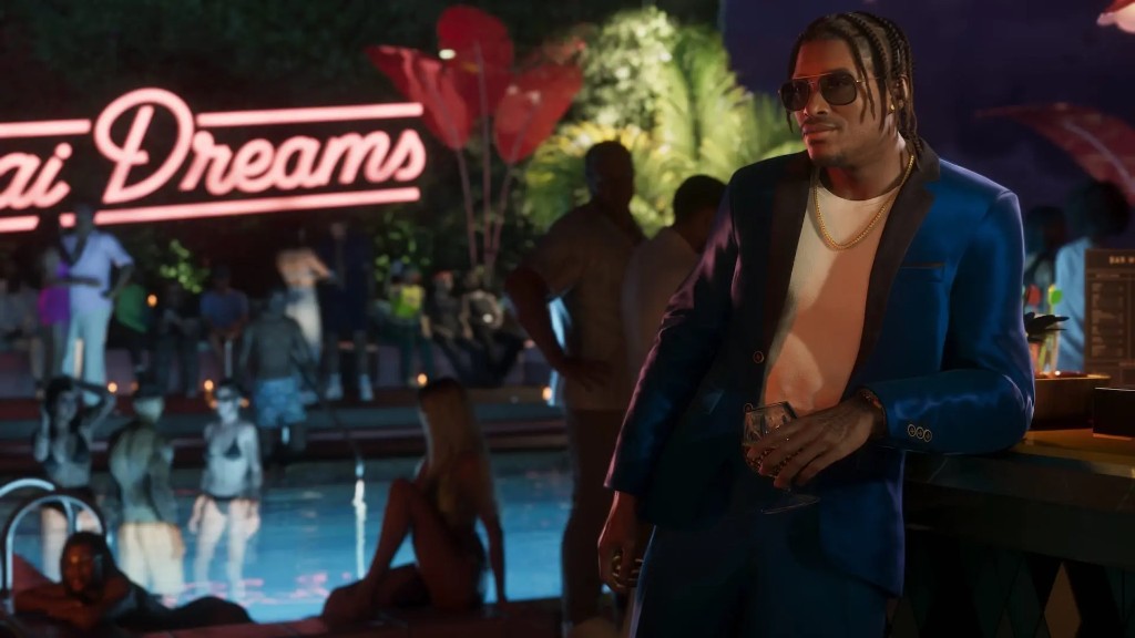 Dre'Quan Priest at a neon pool party bar