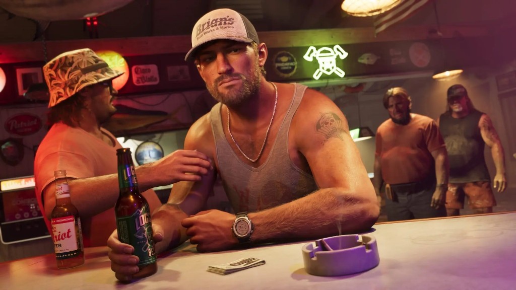 Jason Duval at a dive bar with cash and beer