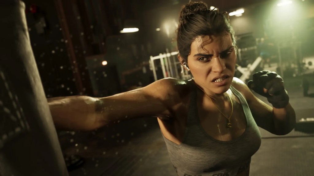 Lucia Caminos punching a heavy bag in the gym