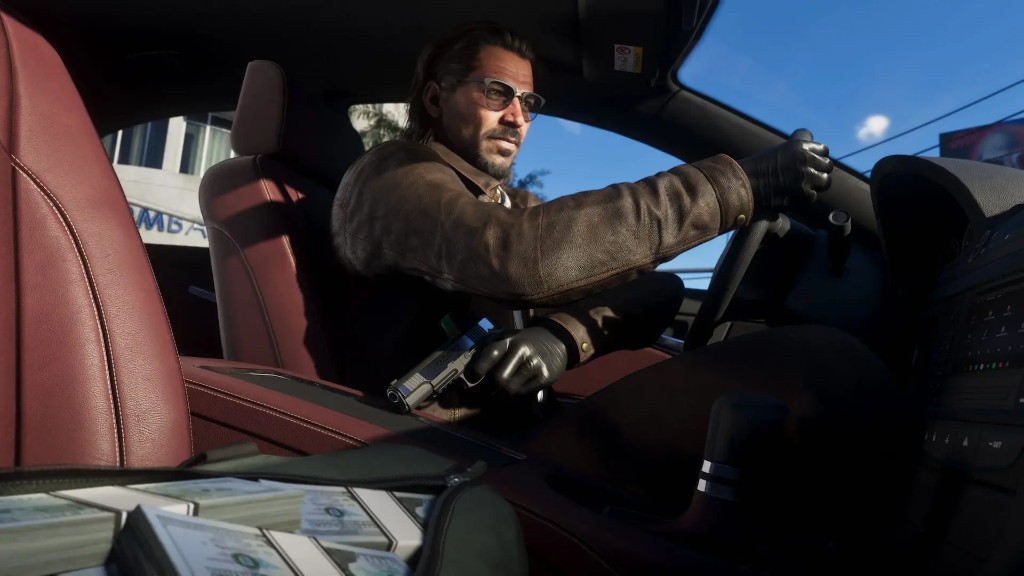 Raul Bautista driving with a bag of cash