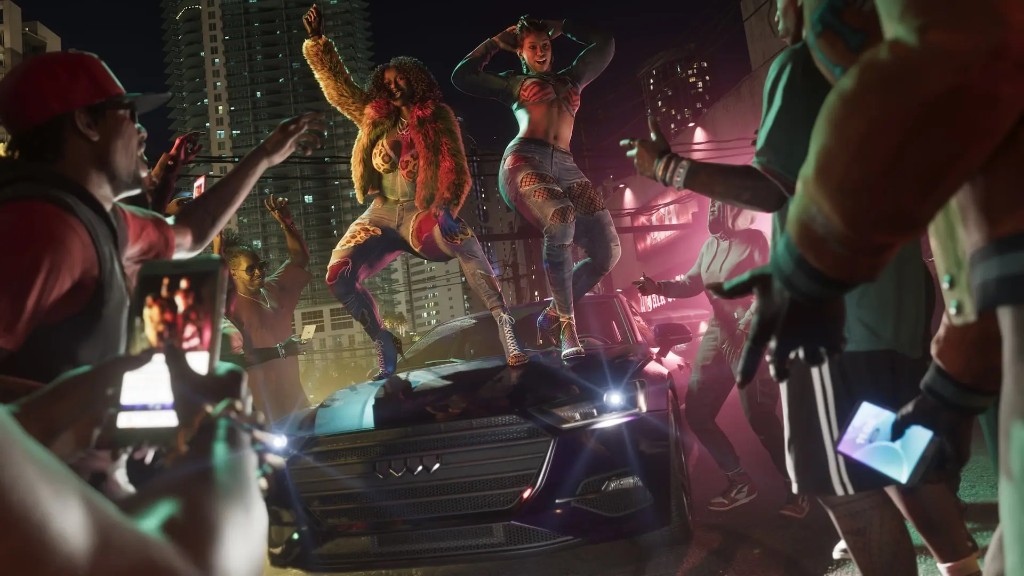 Real Dimez dancing on a sports car for the crowd